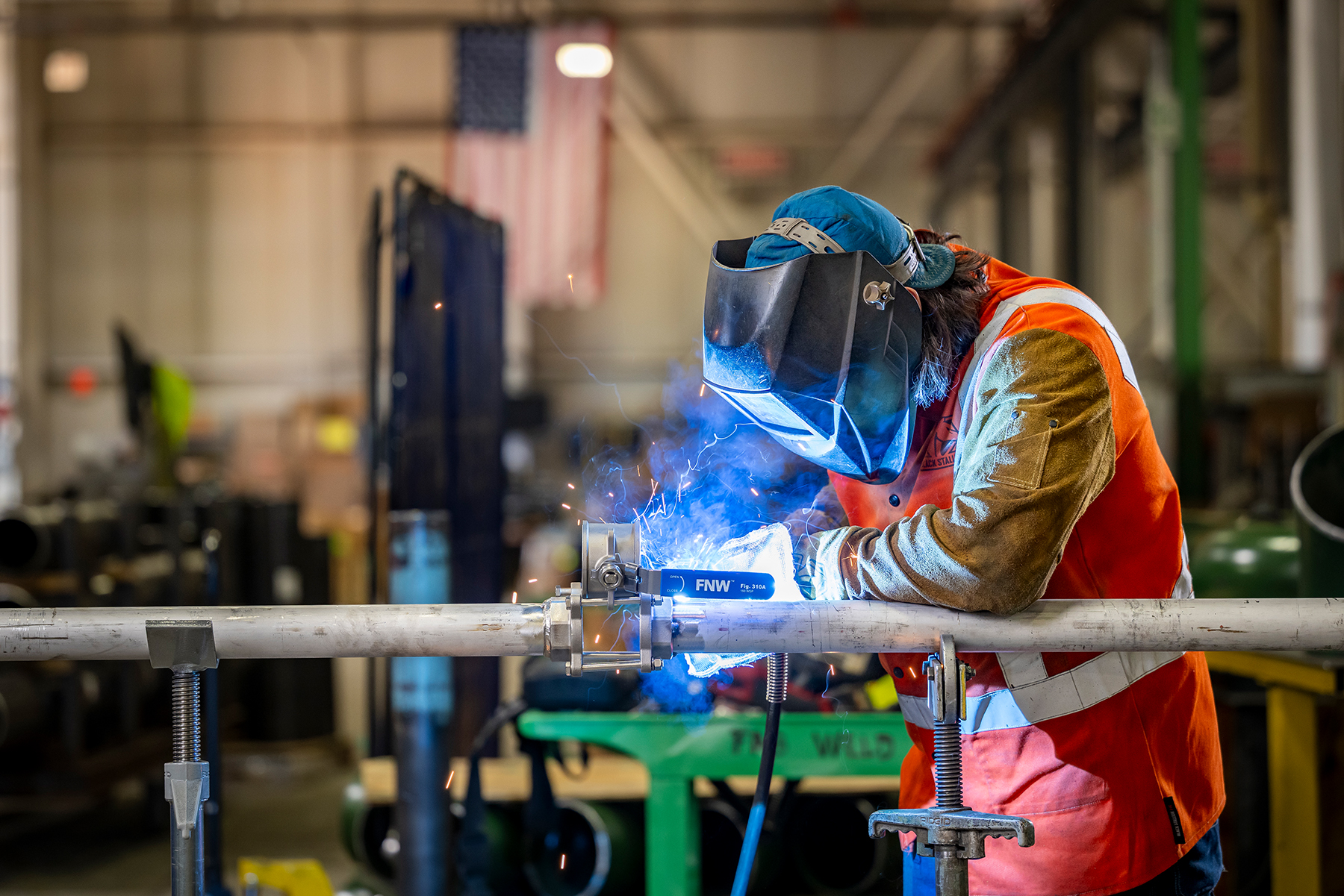 Pipe fabrication technician using FNW valve